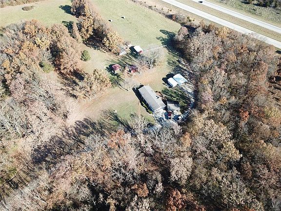 20 + acres with home 