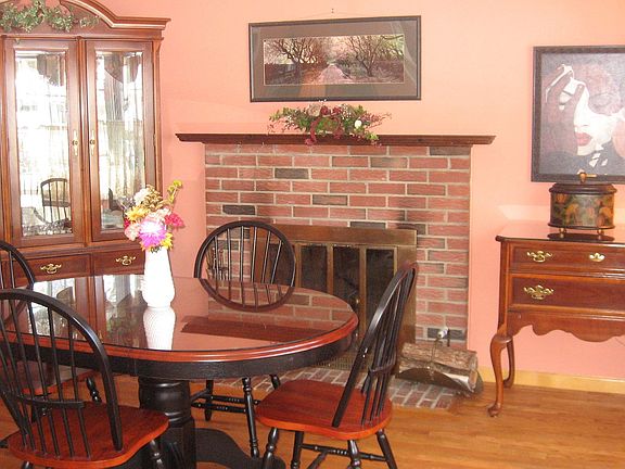 Dining Room w/Fireplace & Bay Window
