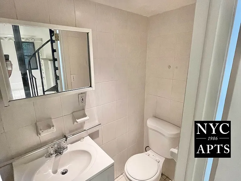 336 E 55th St #B — Photo 10