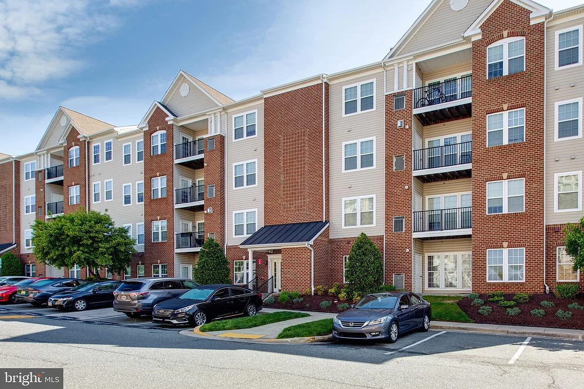 Building Photo - 7557 Stoney Run Dr #101