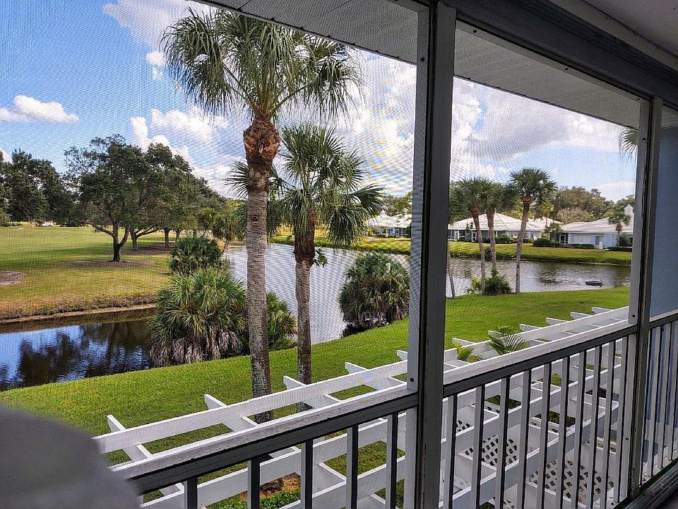 Screened Lanai with Lake and Golf Course view