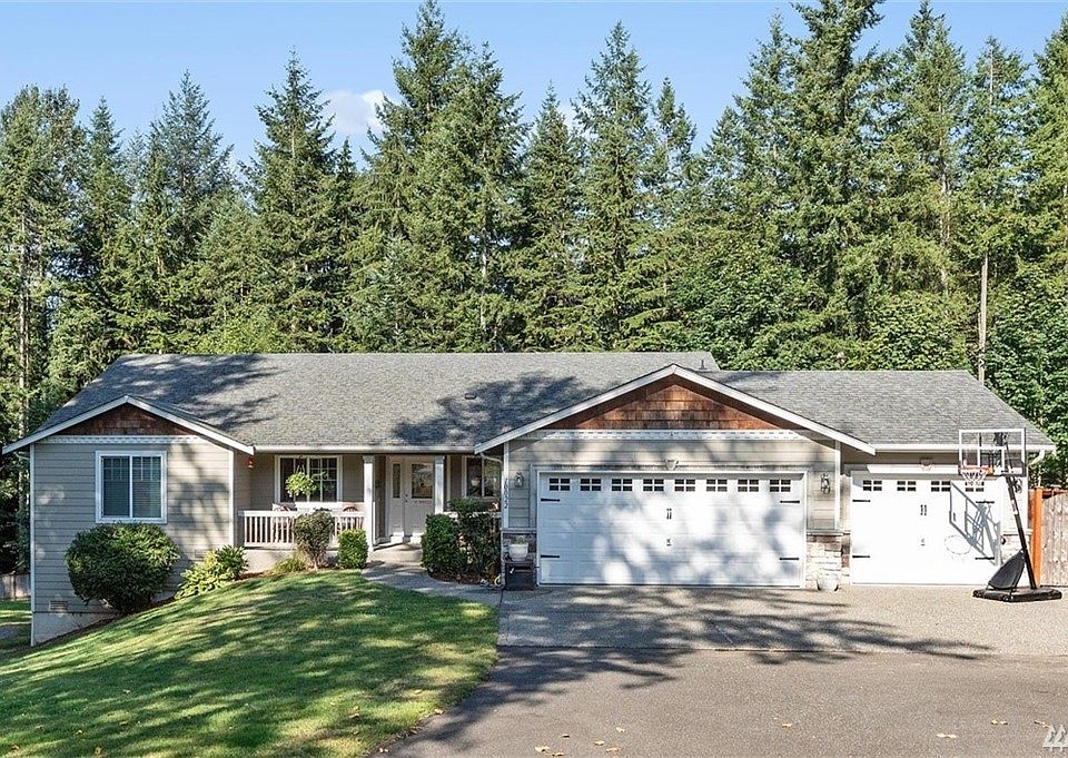 Welcome to this wonderful home secluded down long driveway with greenbelt backdrop.  Three-car garage!