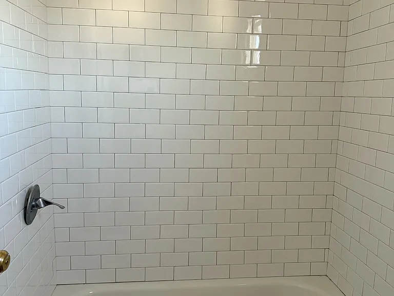 Bathroom, has new sink, new toilet, new tile, new floors, mini-blinds and newly painted