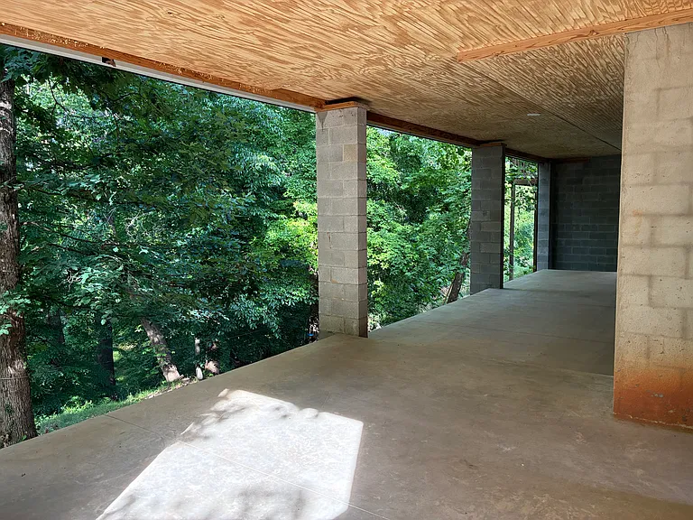 Large covered porch off the basement