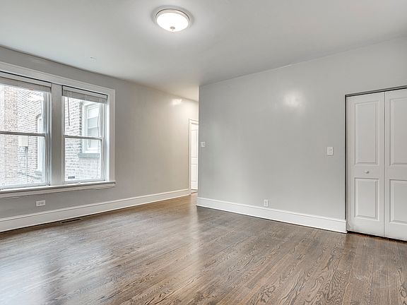Living Room - Gray Turnover & Hardwood Floor