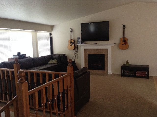 Spacious living room with gas fireplace for warm, cool weath