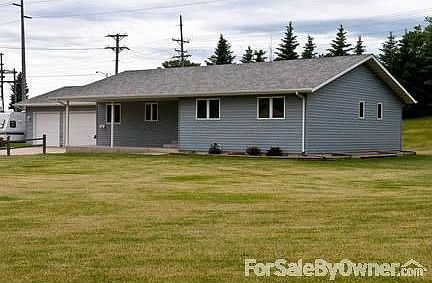 Front of House : -Faces East -Large front yard. -Front loading 3-car garage -Concrete porch