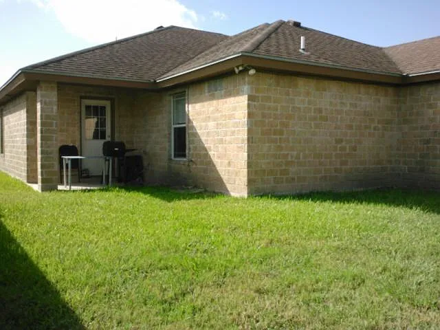 nice covered patio just off kitchen, private fenced back yard