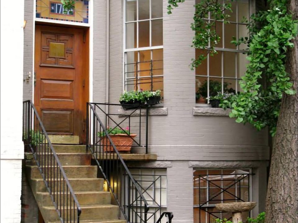 Built in 1905, modernized recently, still has the original door and stained glass.