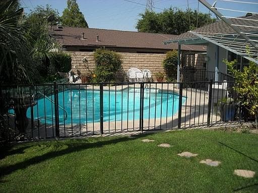 ~ Fenced pool in backyard ~