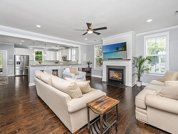 Spacious living area with gas fireplace.