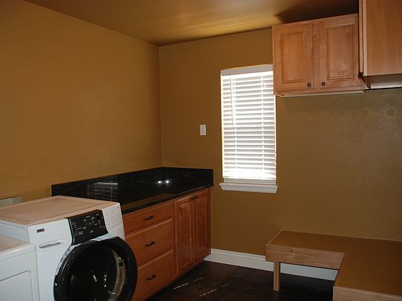 Laundry room with granite 