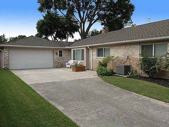 Two-car garage with remote entry.