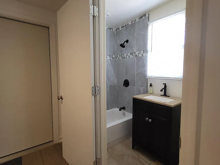 Laundry Leading into full bathroom