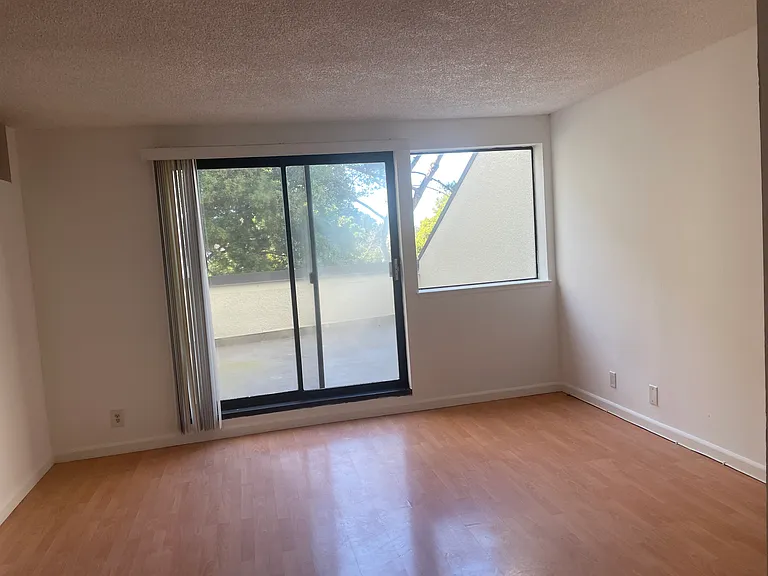 Second Living room area with access to private deck
