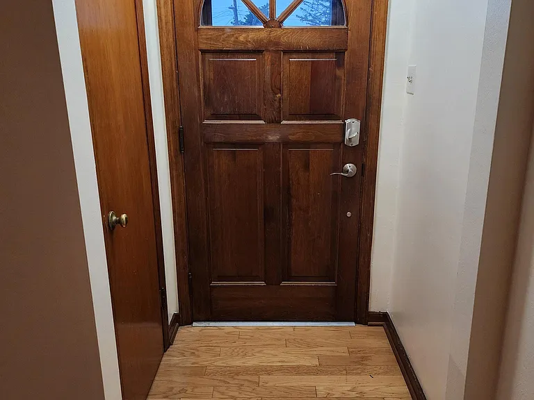 inside front door with coat closet