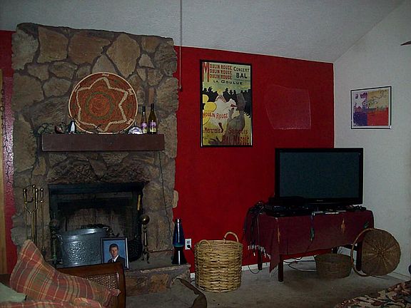 Yet another view showcasing fireplace.