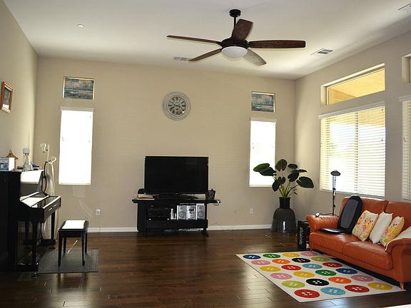 Family room has windows stretch along the back wall for lights and view of the spacious backyard
