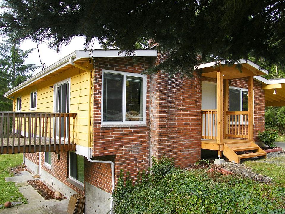 Front of home w/new front entry porch and overhang. 