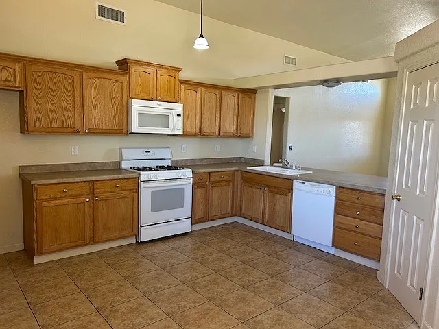 Kitchen area with an open view to the living room