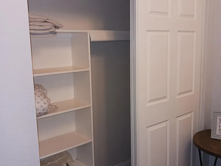 Closet in second bedroom with extra linens