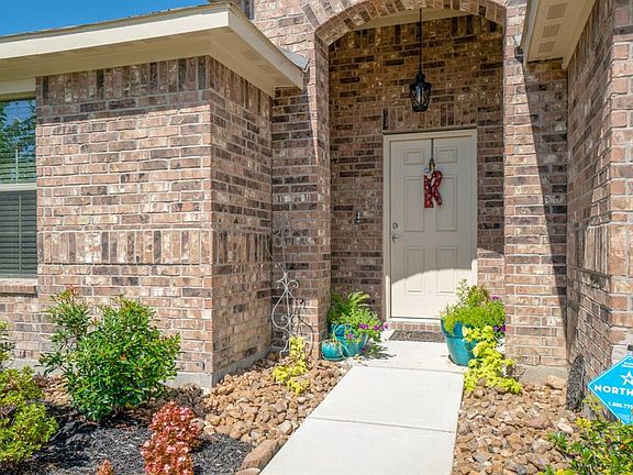 Covered entry with new outside light fixture.