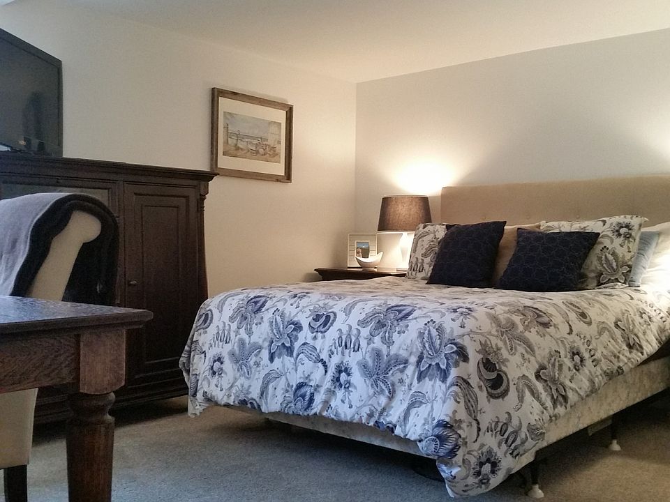 Queen bed featured.