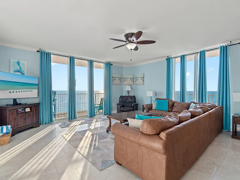 Living room has a view of the emerald waters