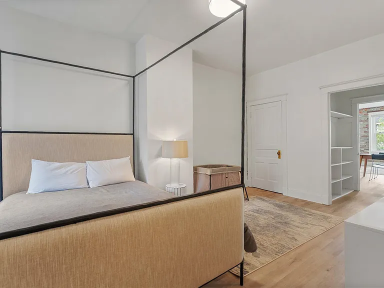 Bedroom with Built Storage Closet