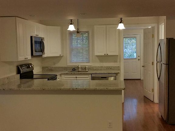 View of kitchen from living room area
