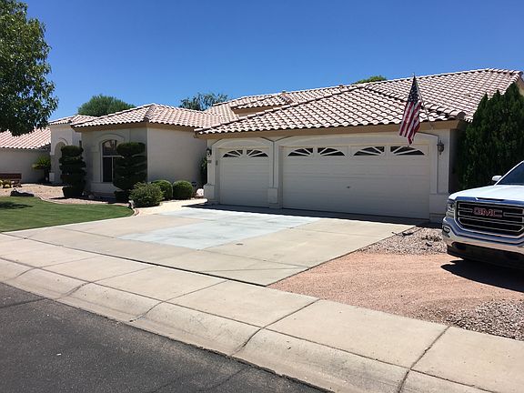 3 Car Garage & Side yard