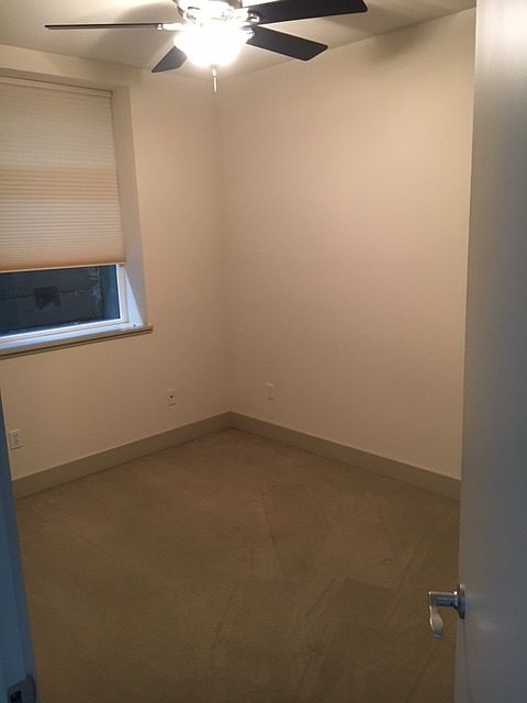 Bedroom 1. Located downstairs, directly behind kitchen.