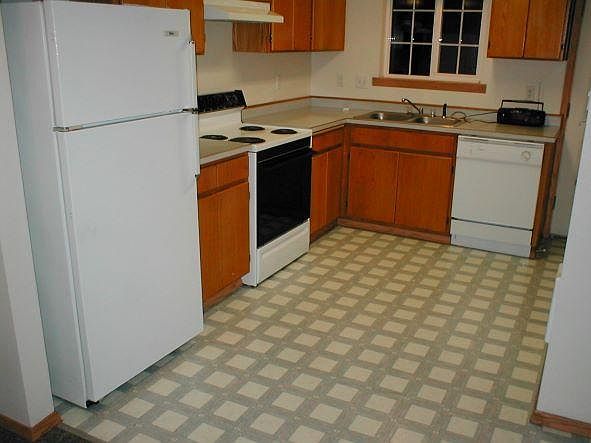 Spacious kitchen with lots of cupboard space.