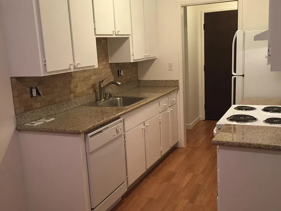 KITCHEN WITH DISHWASHER, DISPOSER AND SELF CLEANING OVEN