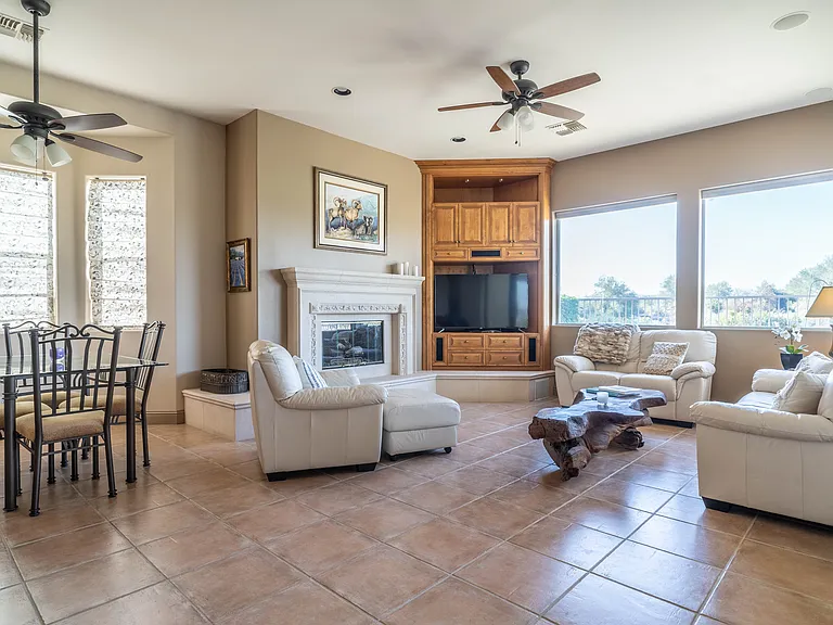 Family room sits off of the kitchen and has a built-in entertainment center. Gas fireplace to stay cozy in the winter months.