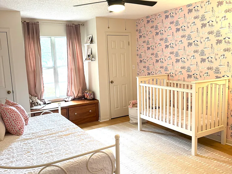 Secondary bedroom with two closets