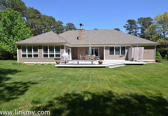 Pristine landscaped yard .90  acre lot
