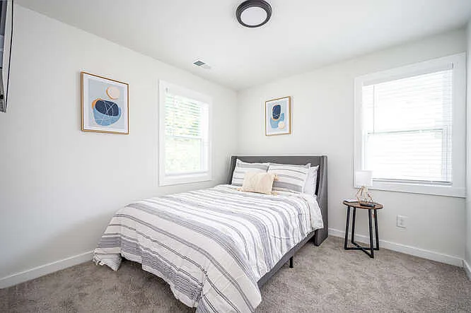 Queen size bed in bedroom 2