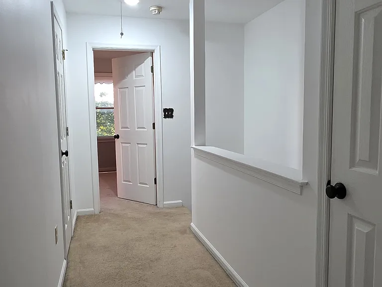 2nd floor hallway equiped with 2 linen closets