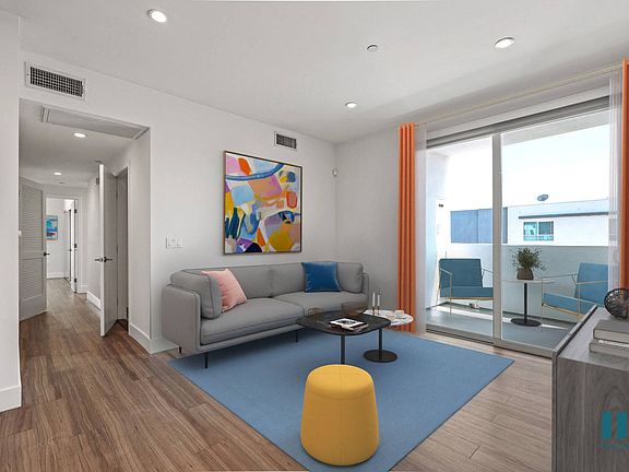 Living Room with Vinyl Flooring, Recessed Lighting, and Patio