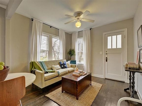 Elegance and charm abound right down to the original crystal doorknobs.