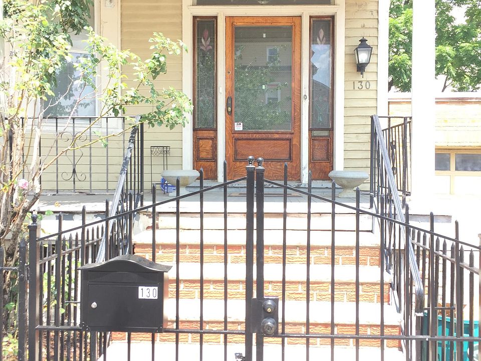 Gated Entrance with adjacent off street parking.