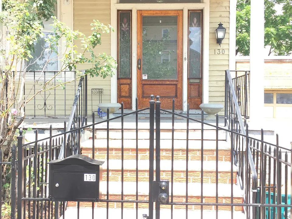 Gated Entrance with adjacent off street parking.