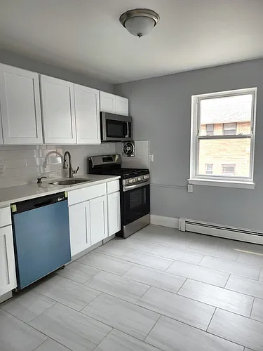 Station Square Apartments Steps from East Rutherford Train Station with Parking Included Photo 1