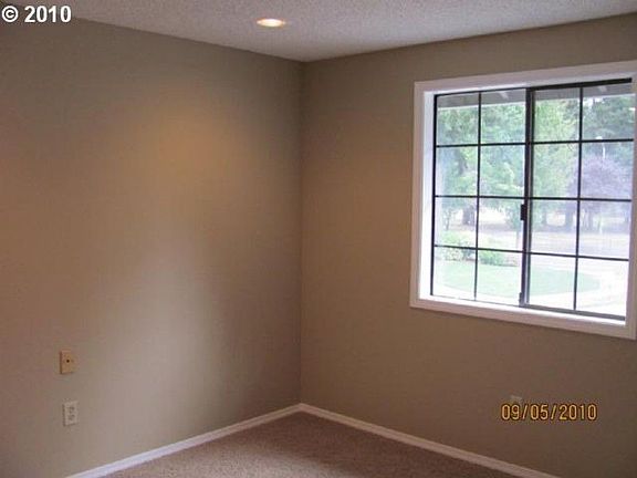 4th image of 406 NE Hearthwood Blvd