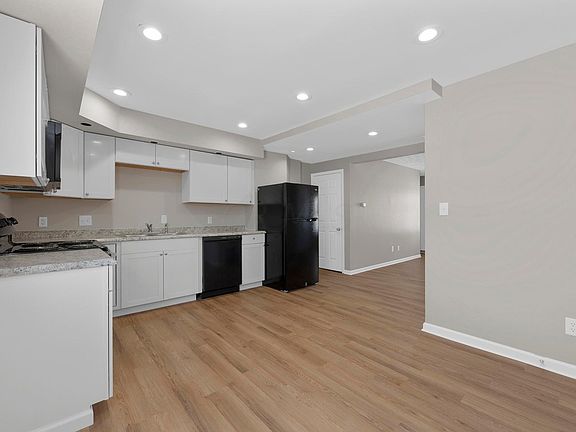 view of kitchen & living room from the dining room
