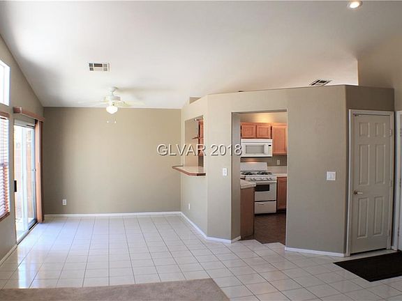 DINING AREA WITH LIGHT FIXTURE / CEILING FAN!