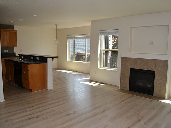Living room, dining, and kitchen