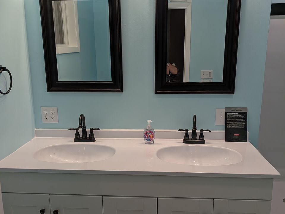 Double vanity with dual outlets