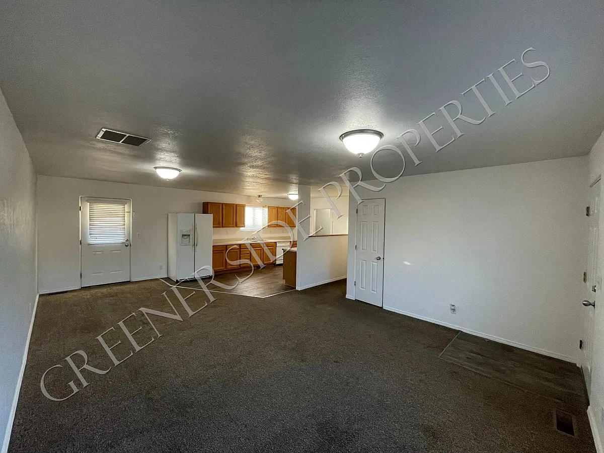 Photo 1 of 14 - 440 2nd Ave W - Wendell, ID Dining and Living Room - 440 2nd Ave W